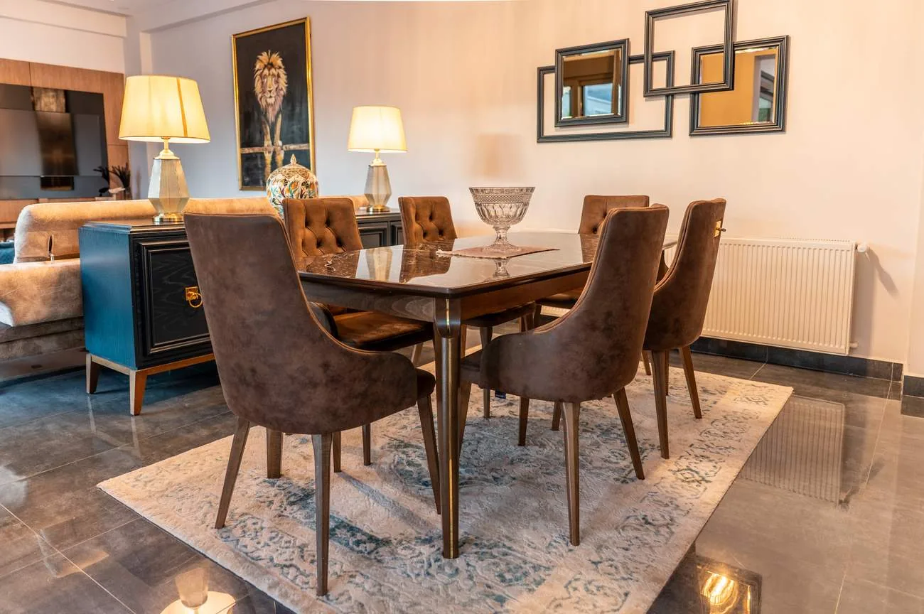 Elegant dining room with marble table for six