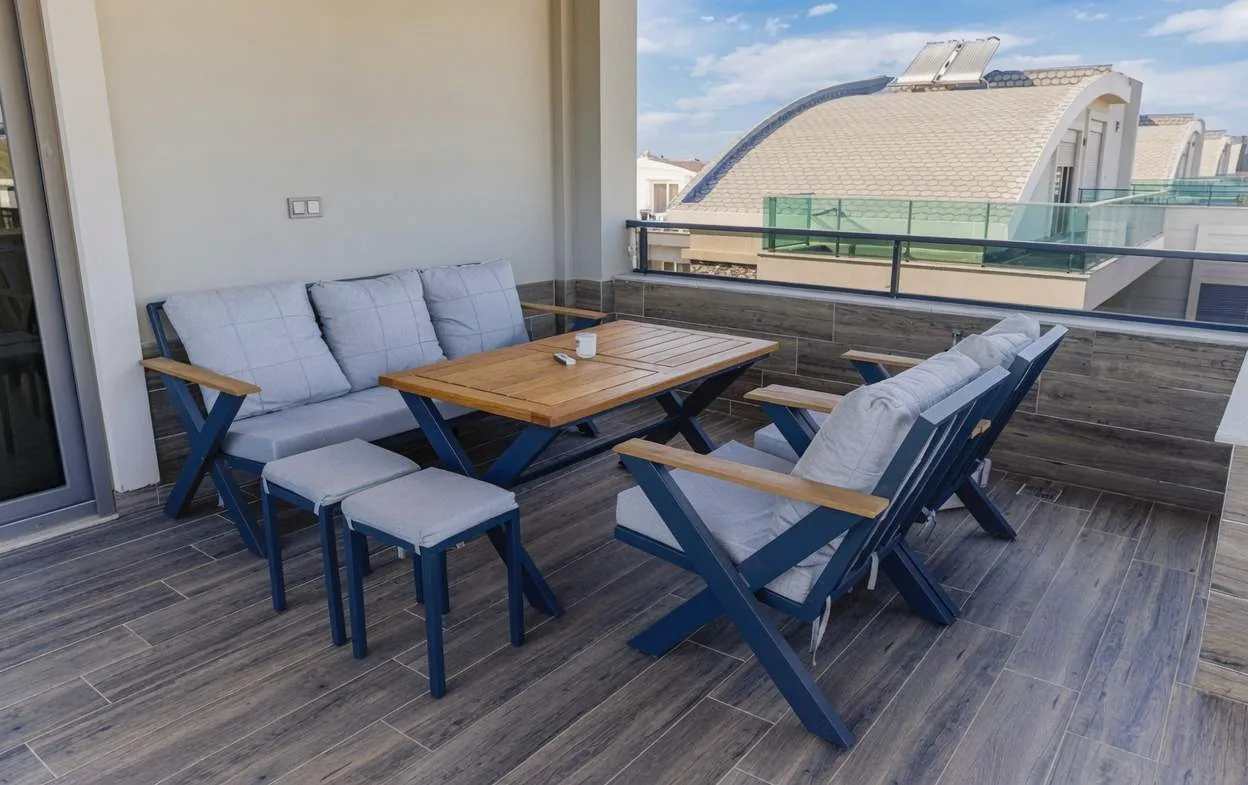 Rooftop terrace lounge with outdoor sofas